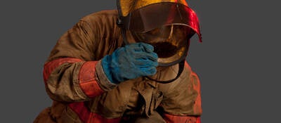 Firefighter wearing unclean gear